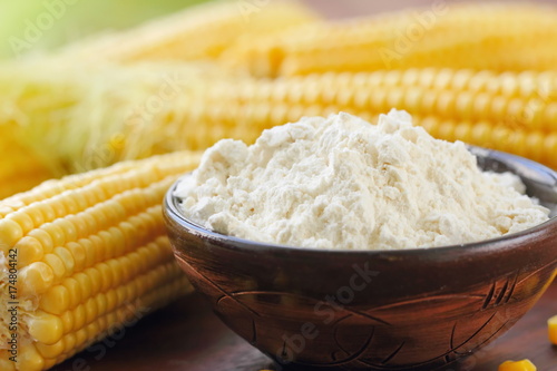 Foto Corn flour and corn cob on the table