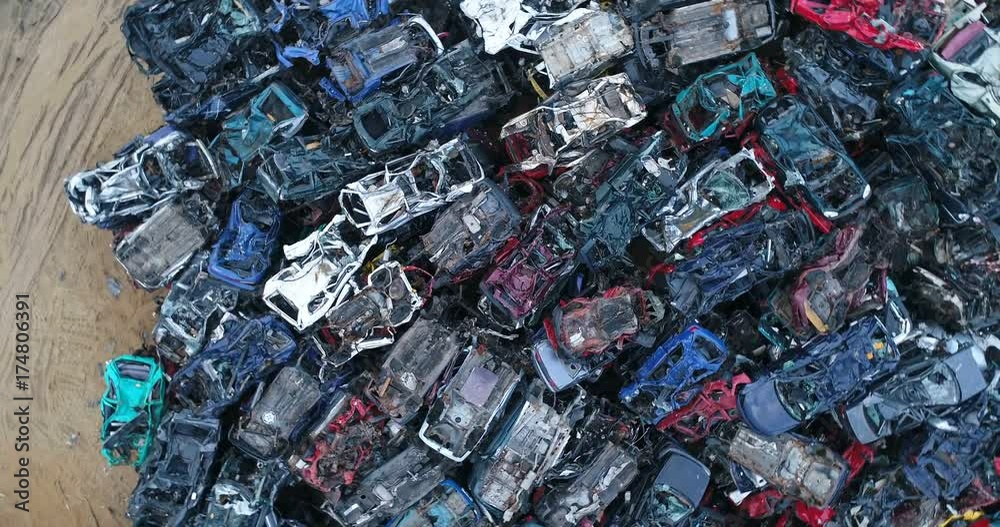Old cars stacked in scrapyard. Car recycling Old cars stacked in scrapyard. Car recycling