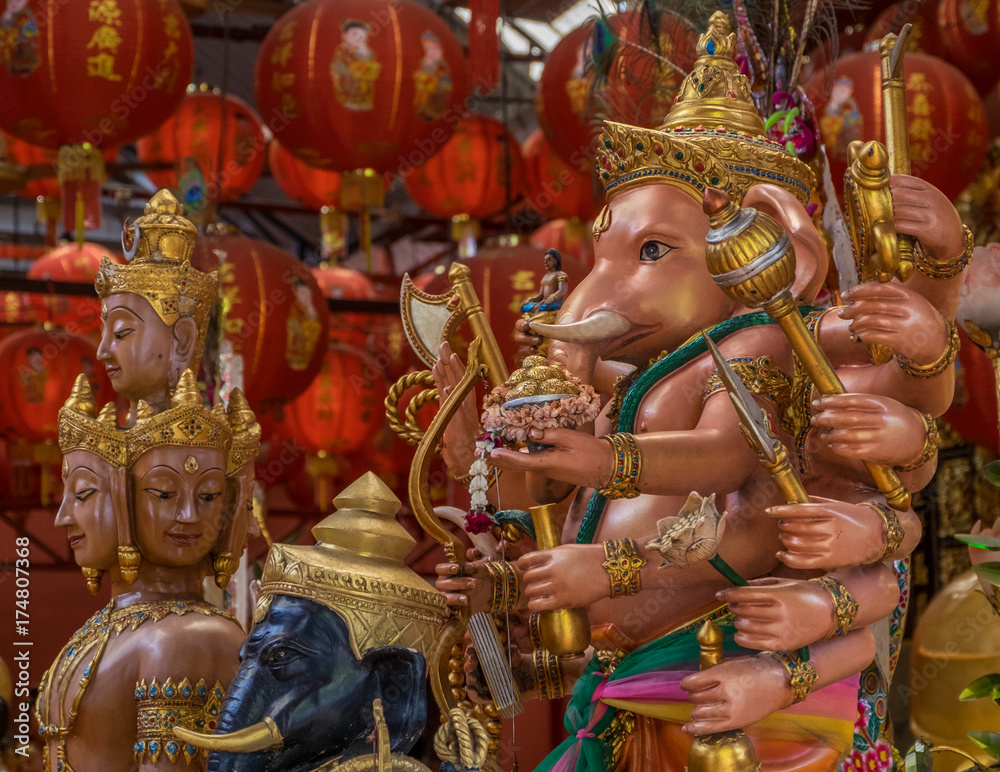 Golden statues in a Buddhist temple in Bangkok Thailand