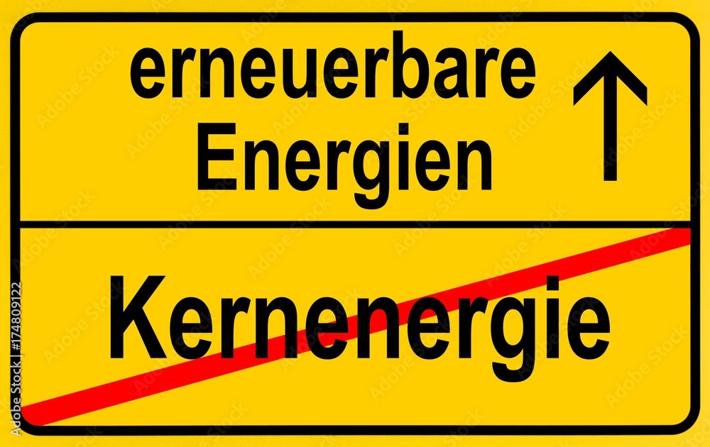 Symbolic image in the form of a town sign, in German, exit from nuclear energy, entrance into renewable energy sources Symbolic image in the form of a town sign, in German, exit from nuclear energy, entrance into renewable energy sources