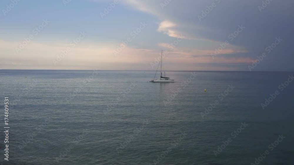 Sailboat in the middle on the sea Sailboat in the middle on the sea