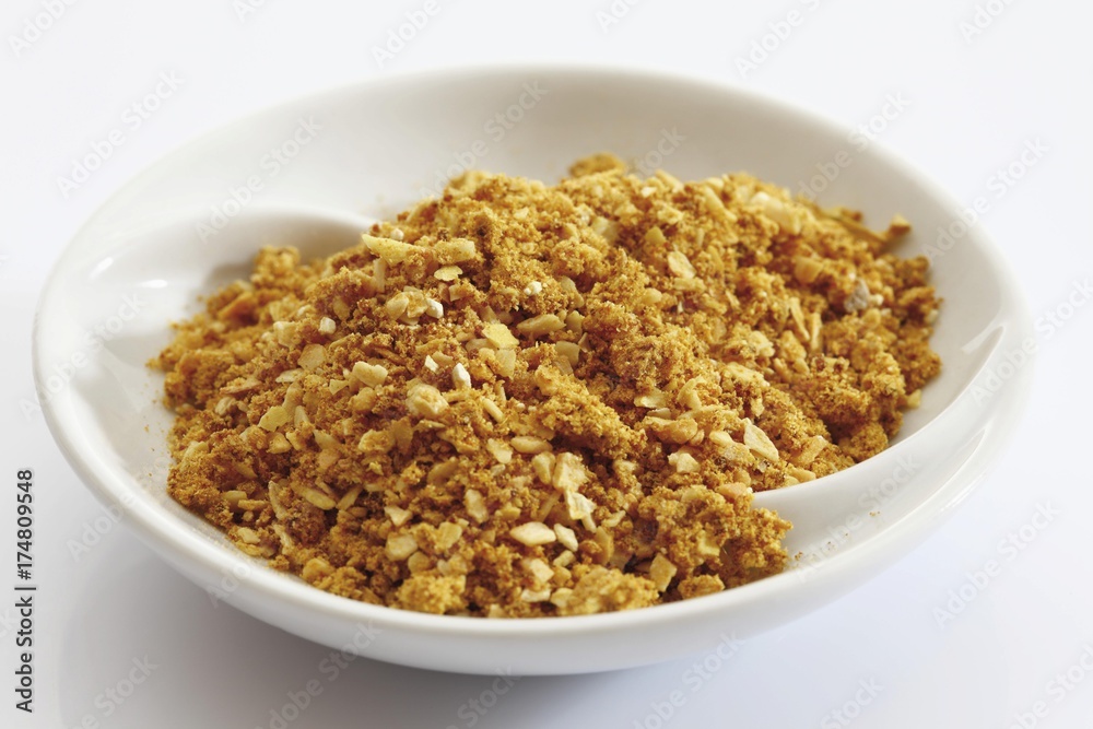Cafe de Paris spice blend in a small porcelain bowl Cafe de Paris spice blend in a small porcelain bowl