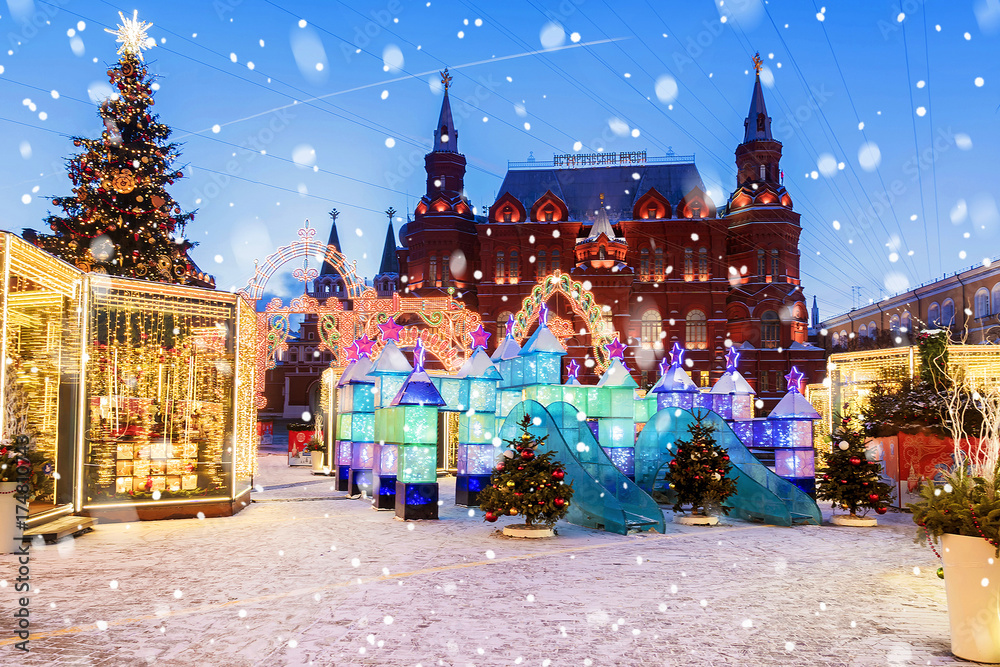 Christmas in Moscow. Manezhnaya Square decorated for Christmas in Moscow.The inscription on the building in Russian: Historical Museum