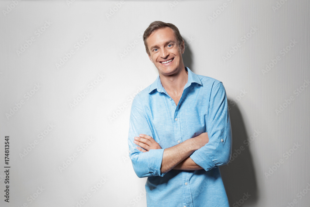 Handsome man on light background Handsome man on light background