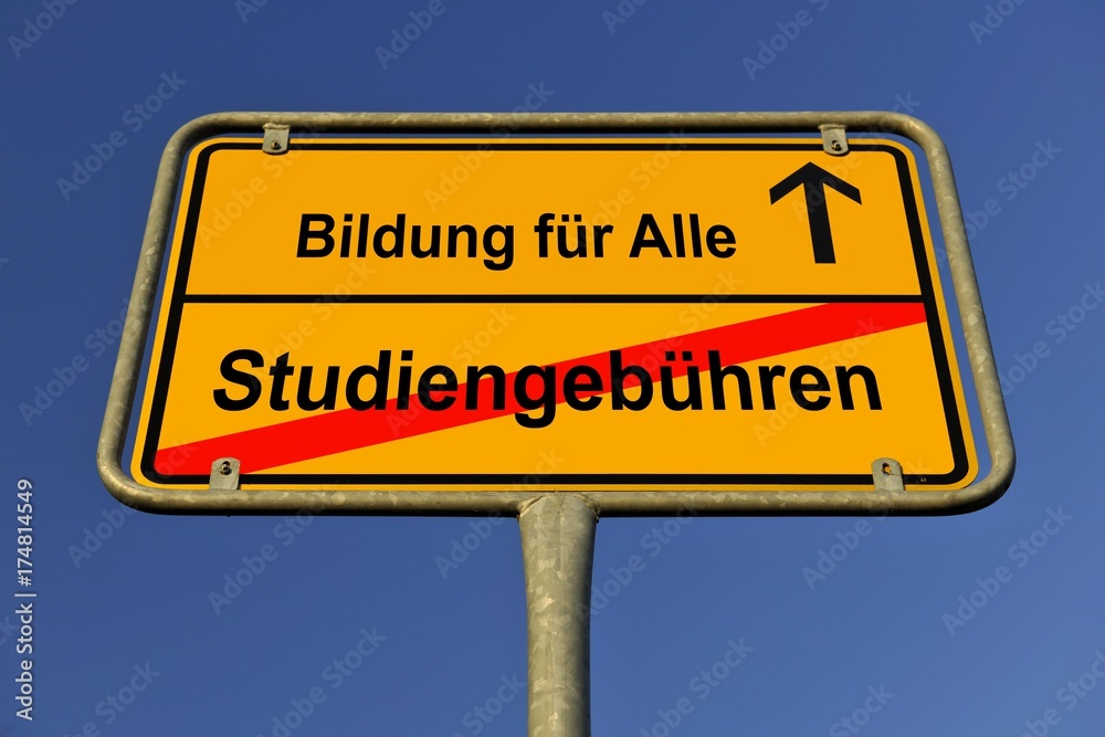 City limits sign with the words Bildung fuer Alle and Studiengebuehren, German for education for everybody and tuition fees, symbolic image for the abolition of tuition fees to enable the right to education for all City limits sign with the words Bildung fuer Alle and Studiengebuehren, German for education for everybody and tuition fees, symbolic image for the abolition of tuition fees to enable the right to education for all