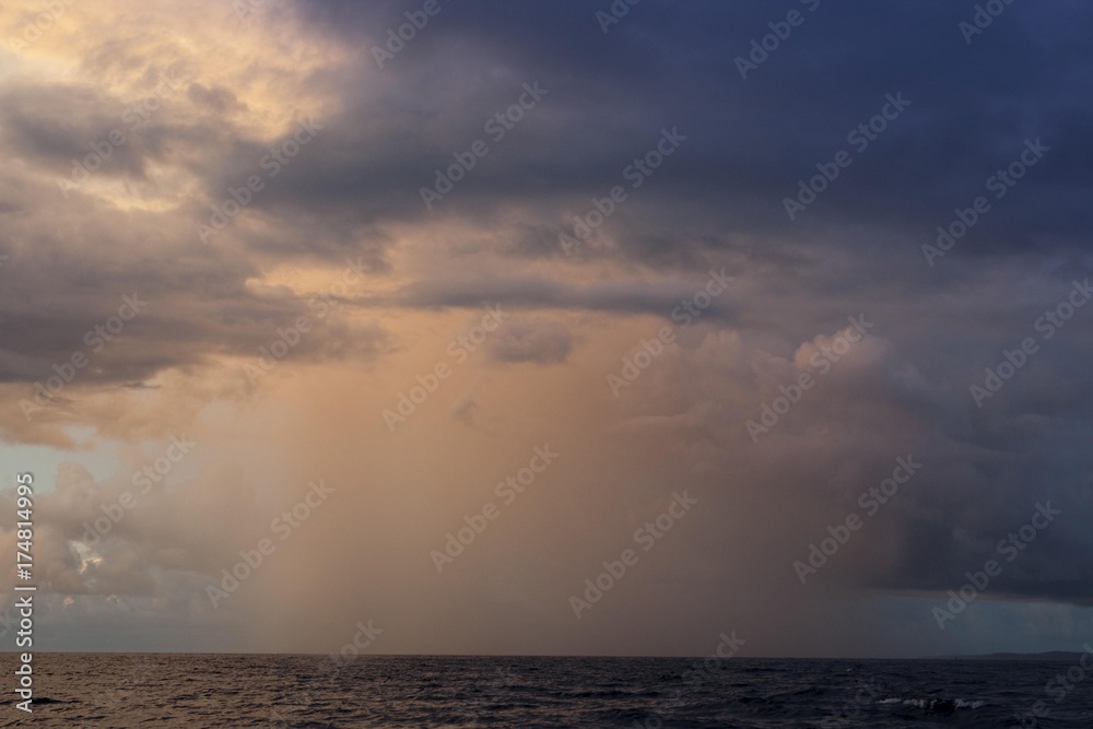 Storm, rain shower and thunderstorm over the sea