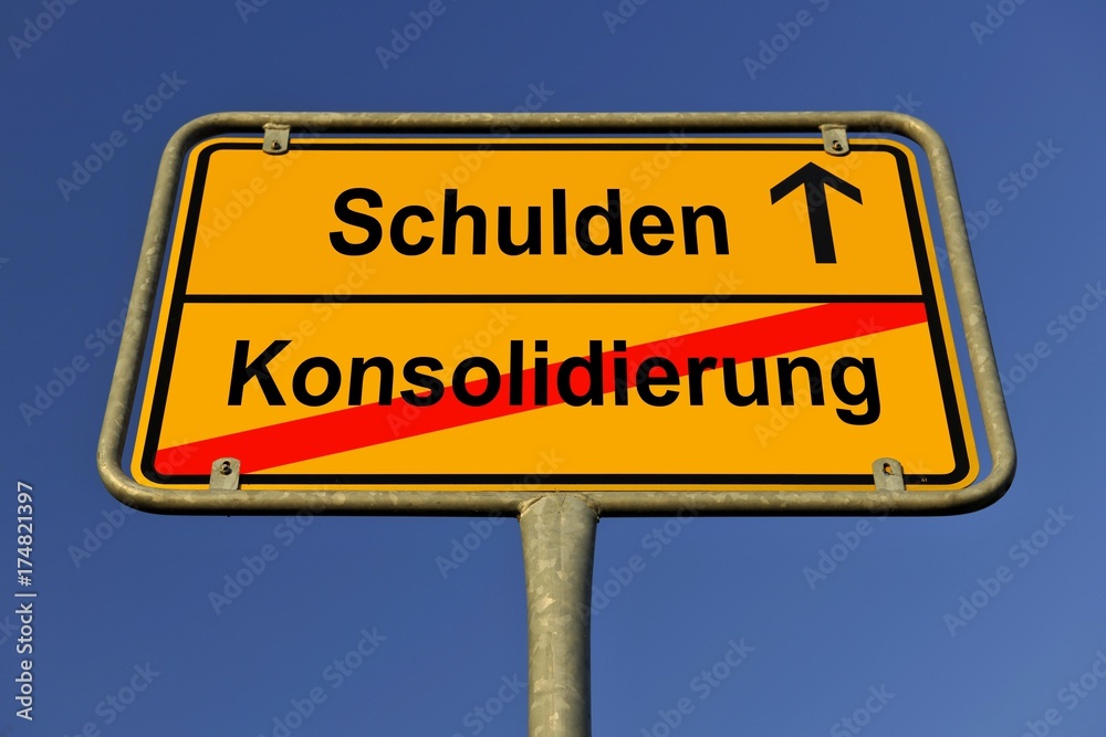 City limit sign, symbolic image for the way from a Konsolidierung to Schulden, German for going from a consolidation to having debts City limit sign, symbolic image for the way from a Konsolidierung to Schulden, German for going from a consolidation to having debts