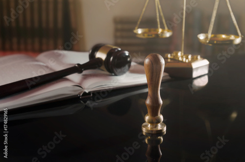 Court gavel, scale of justice, law theme.