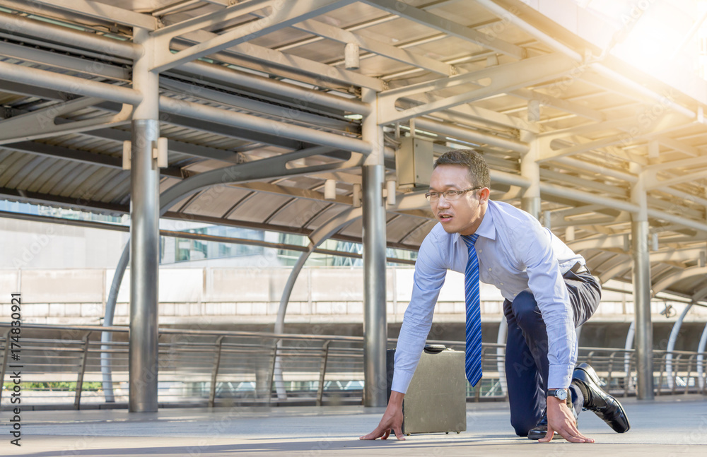 Business man in start position runner city background, Start for success concept. Business man in start position runner city background, Start for success concept.