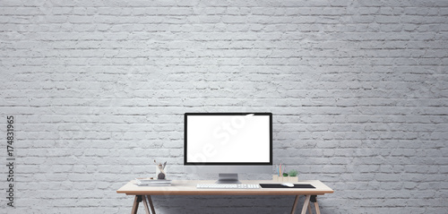 Computer display and office tools on desk. Desktop computer screen isolated. Modern creative workspace background. Front view
