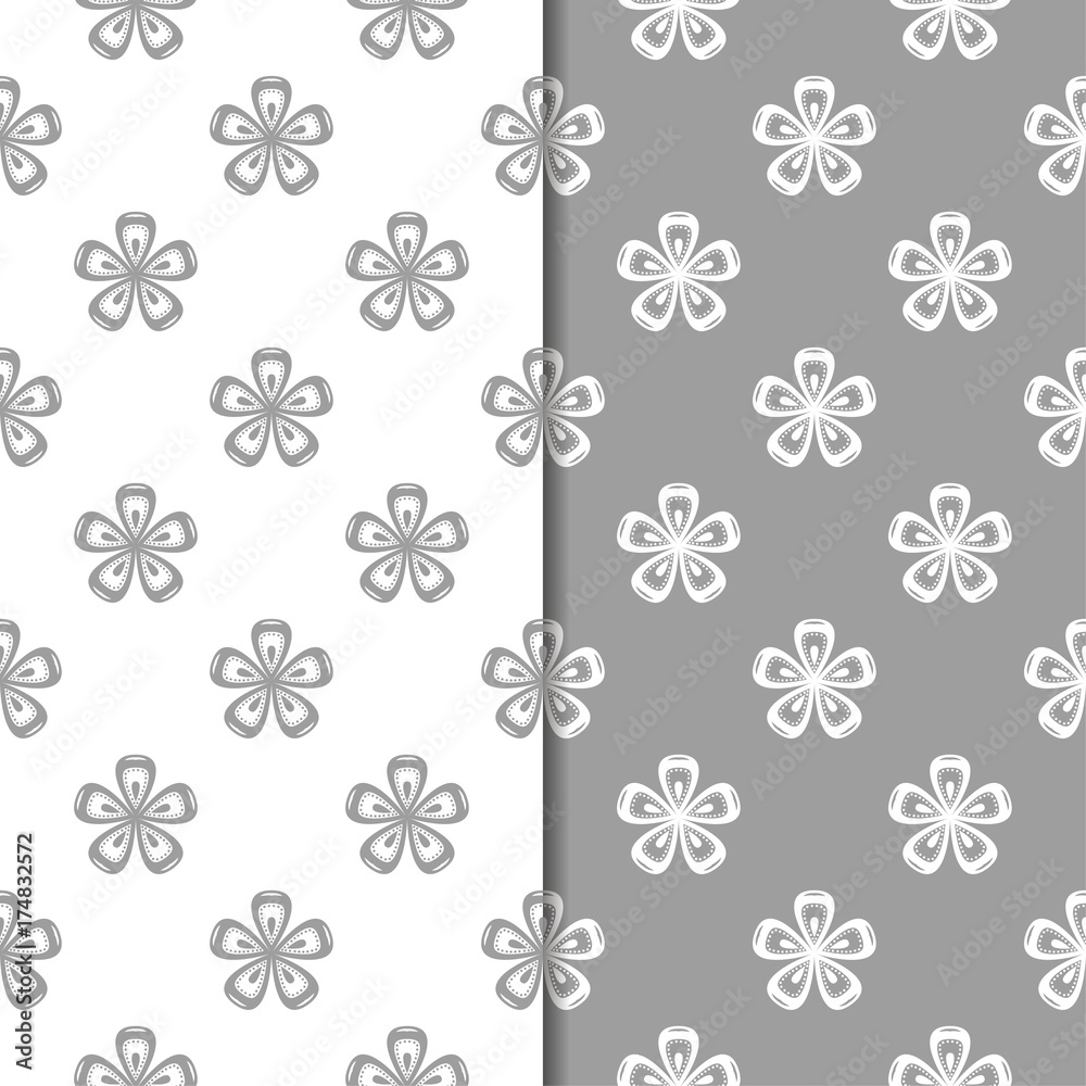 White and gray set of floral seamless patterns White and gray set of floral seamless patterns