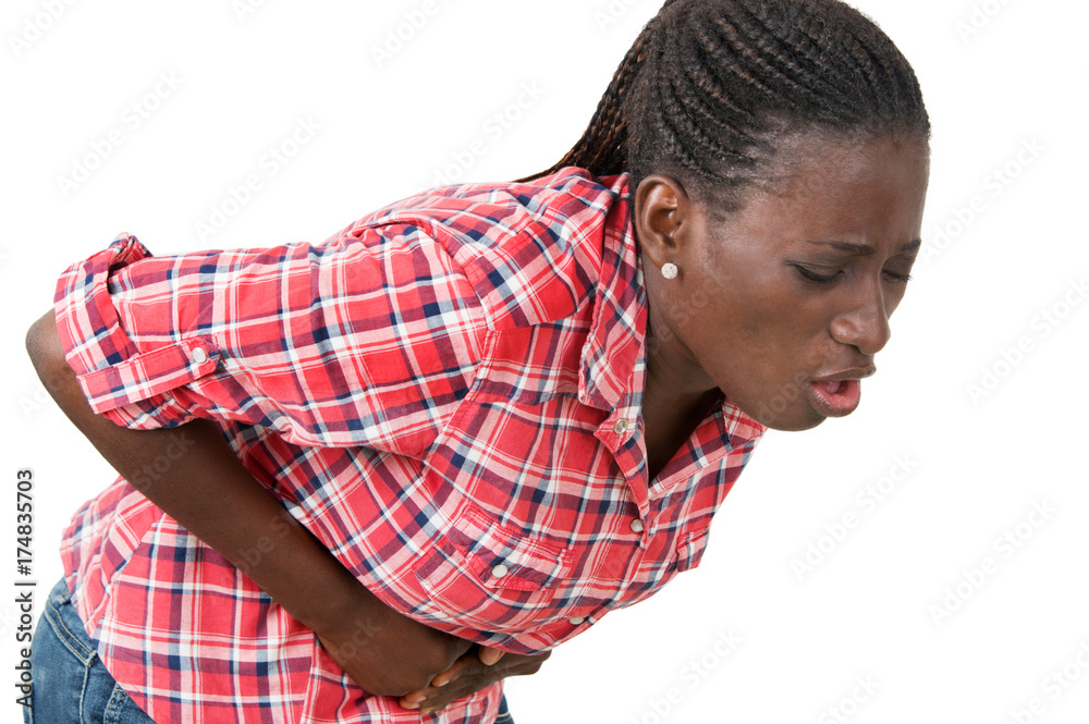 Studio shot of a young woman suffering from nausea Studio shot of a young woman suffering from nausea