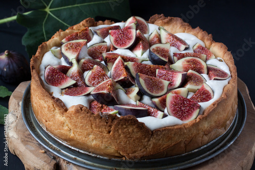 Fig tart on a black background