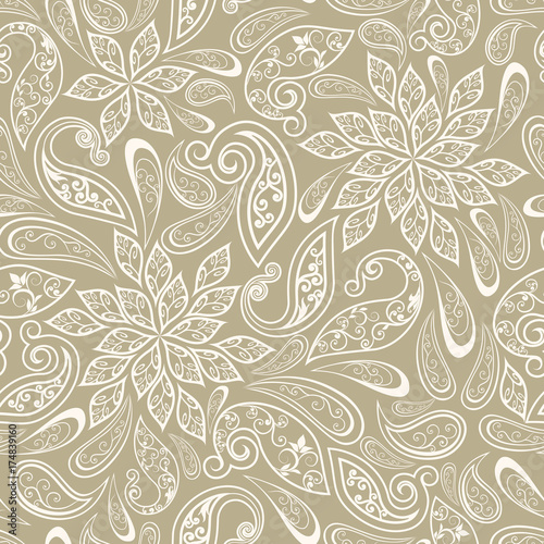 Seamless pattern in ethnic traditional style. Abstract vintage pattern with decorative flowers, leaves and Paisley pattern in Oriental style.