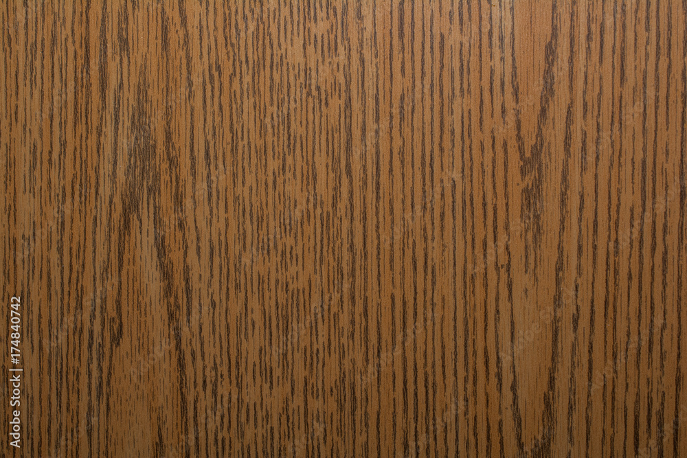 Close up of faux wood grain panel for background or texture Stock