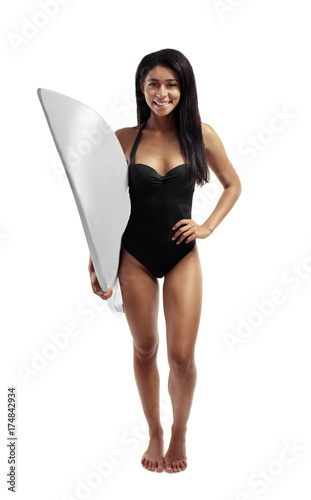 Beautiful young woman in swimming suit and with surf board on white background © Africa Studio