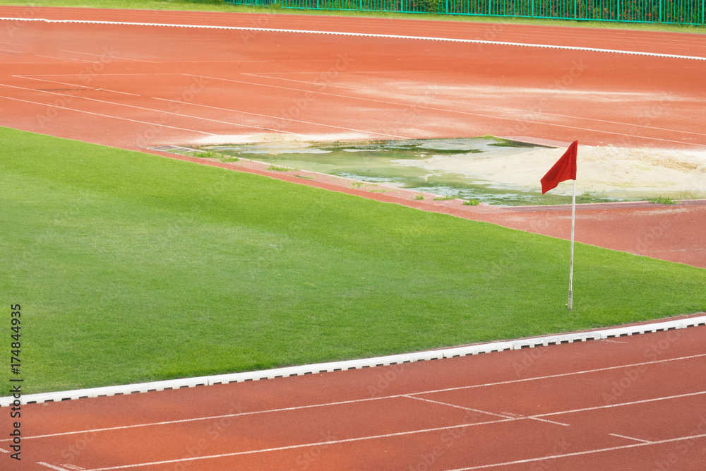 Fototapeta premium Soccer field with red flag on conner