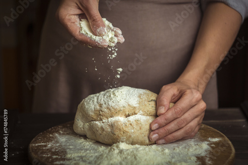 The chef's hands that knead the dough.