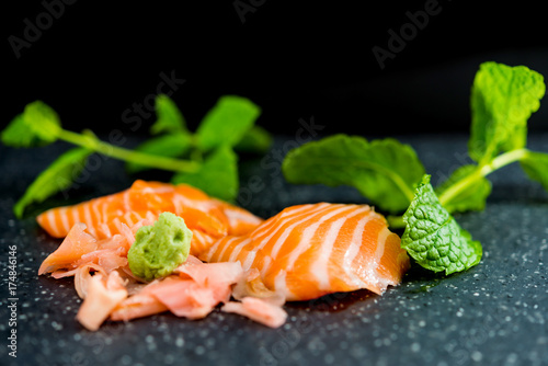 raw fish salad and vegetables fruit