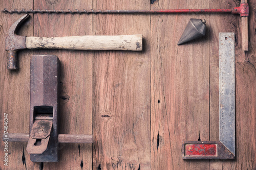 various of old carpenter tools on old wood plank