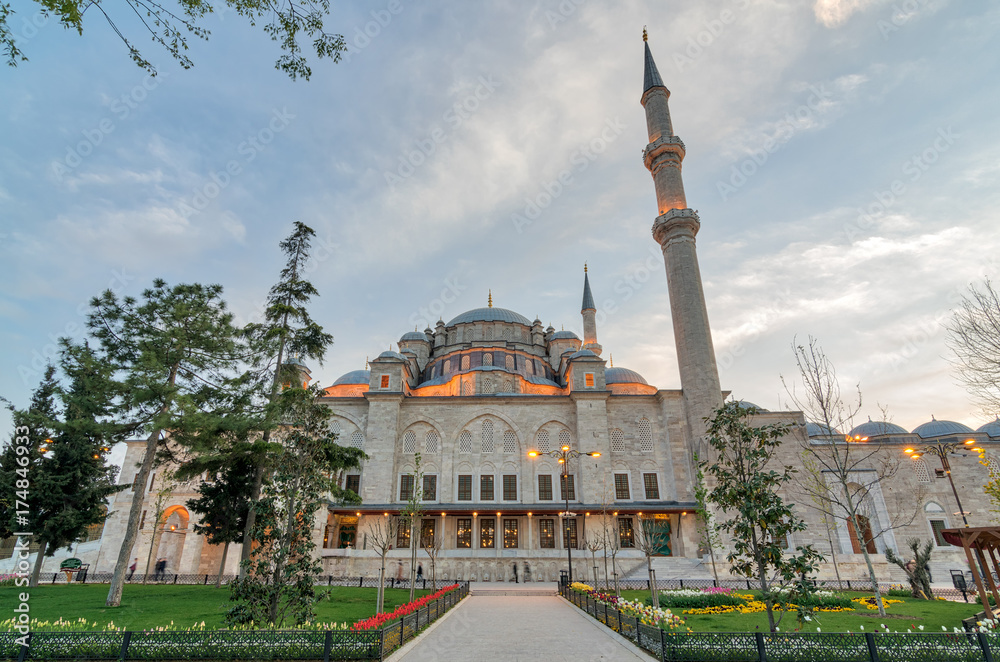 Exterior low angle shot of Fatih Mosque before dusk. An Ottoman imperial mosque located Fatih district, Istanbul, Turkey