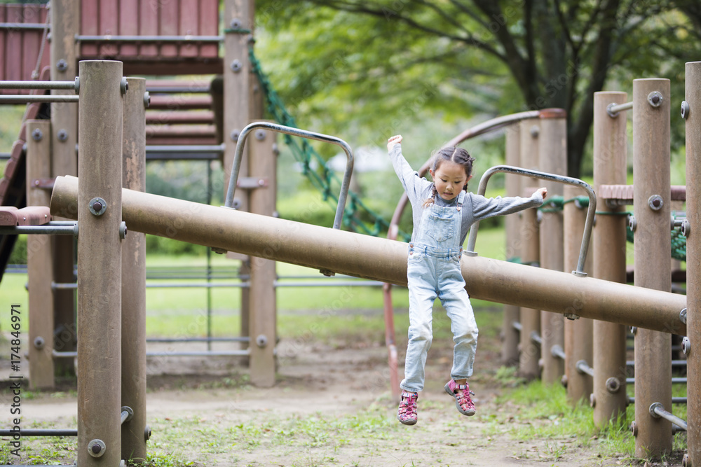 Happy Little Girl Playing in the Park Happy Little Girl Playing in the Park