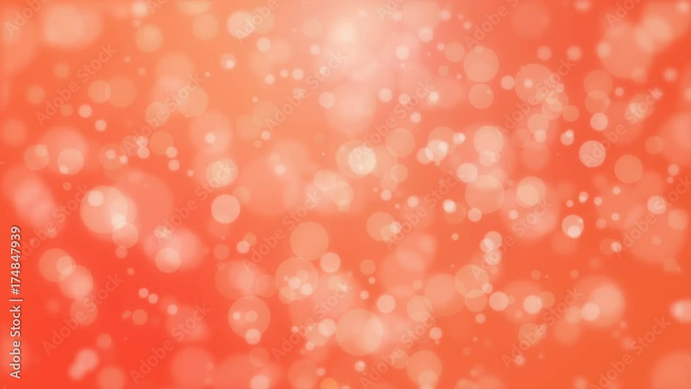 Festive orange red glowing bokeh background with floating light particles. Festive orange red glowing bokeh background with floating light particles.