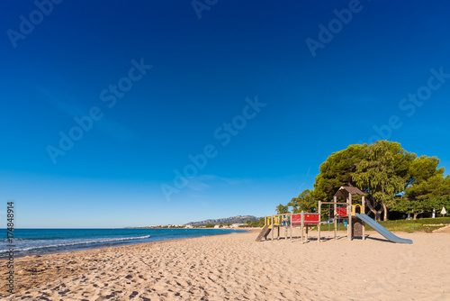 Sand beach in Miami Platja, Tarragona, Catalunya, Spain. Copy space for text.
