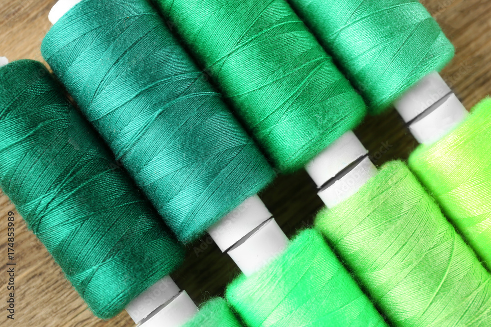 Many threads of different green shades, closeup Many threads of different green shades, closeup