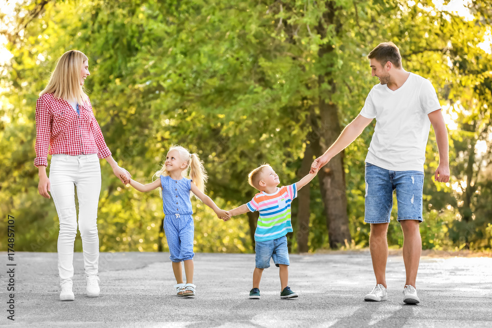 Happy family in park on sunny day