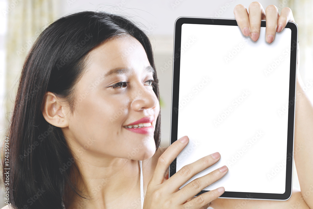 Beautiful woman holding a blank board Beautiful woman holding a blank board