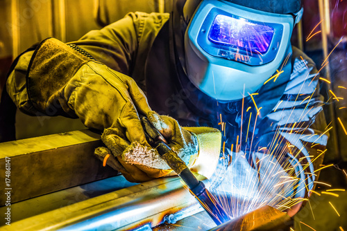 Industrial steel welder in factory technical,