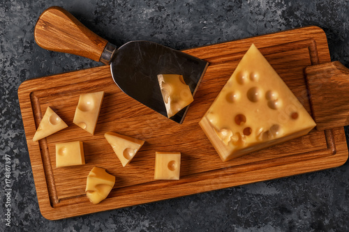 Cheese on cutting board.