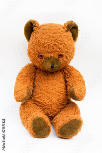 Old teddy bear isolated - communist toy