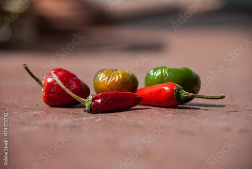 Variety of hot peppers in a small wicker basket