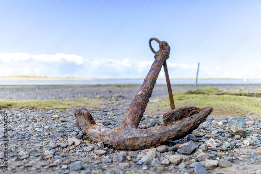 Fototapeta premium Anchor on the estuary at Ravenglass in Cumbria, England, United Kingdom
