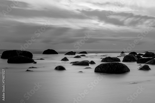 Beautiful seascape background, rock in the Irish Sea at Seascale beach, Cumbria, England, United Kingdom