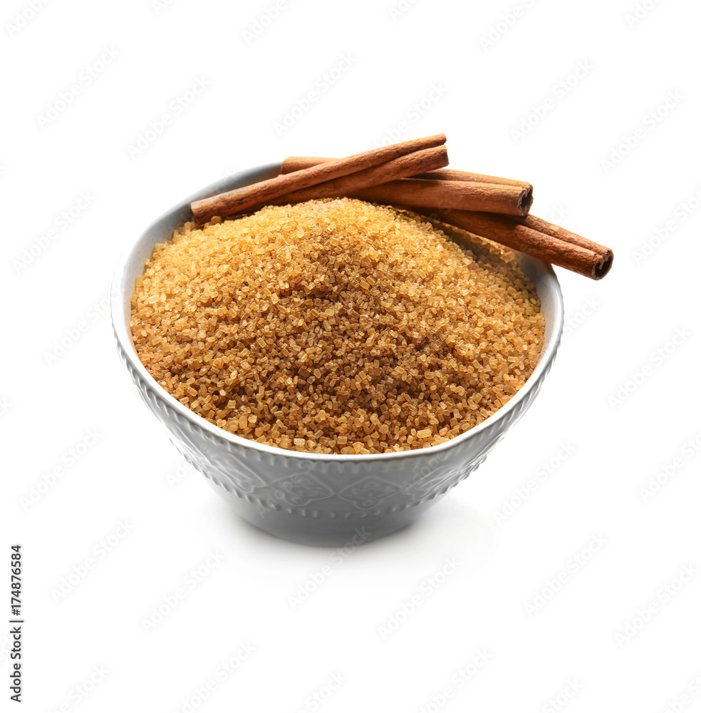 Sweet cinnamon sugar in bowl on white background Sweet cinnamon sugar in bowl on white background