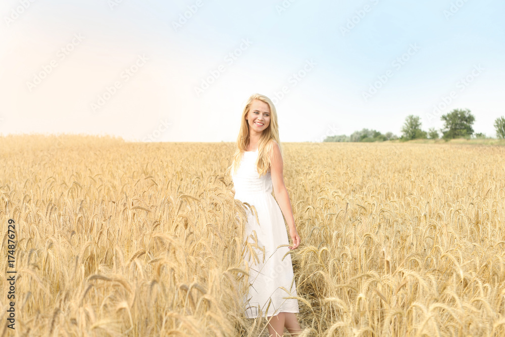 Young woman in wheat field Young woman in wheat field