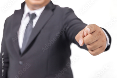 businessman in a suit pointing with his finger