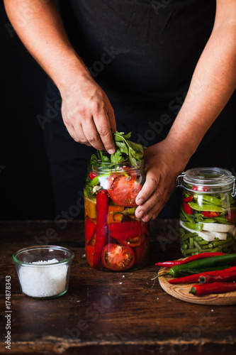Canning tomatoes pickled Preserving tomatoes  add aromatic herbs