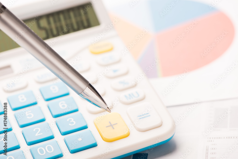 Financial statements. Business Graph. Focus on pen. Financial statements. Business Graph. Focus on pen.