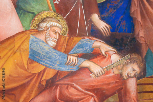 Fresco in San Gimignano - Saint Peter and Malchus photo