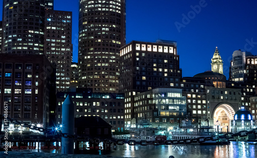 Night skyline from the harborwalk in Boston Seaport