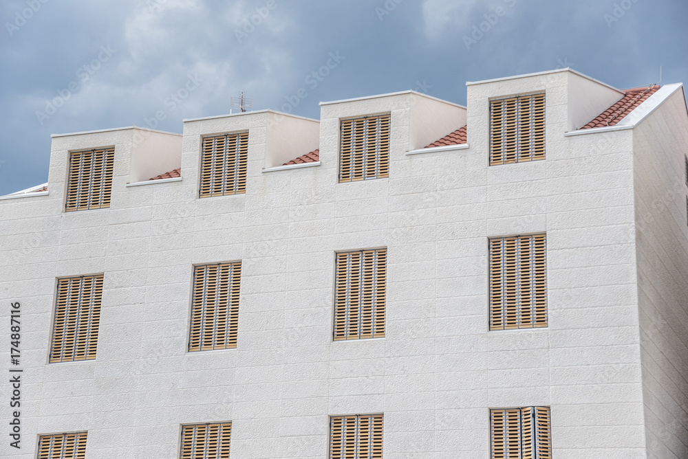 Obraz premium White building with beautiful windows.
