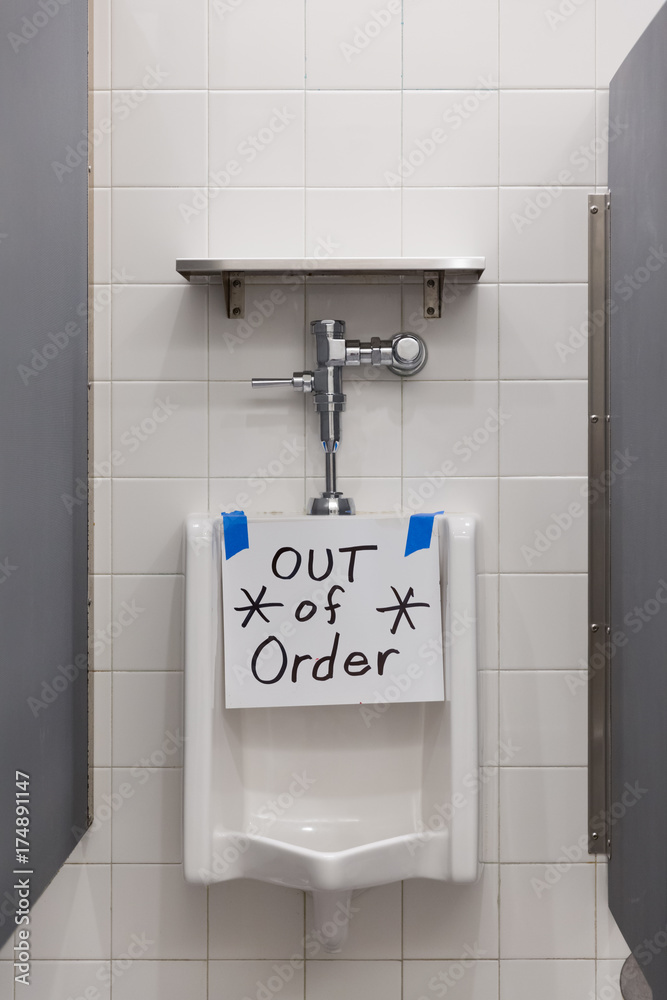 public toilet men restroom. Male bathroom and broken toilet bowl in