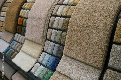 Colorful carpet samples in the store photo