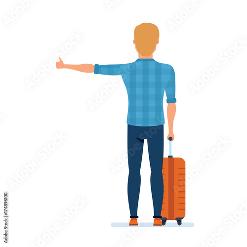 Young traveler stands on the road and catches passing car.