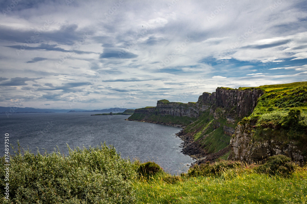 Gorgeous view of the sea-cliffs on the Trotternish Peninsula near Kilt Rock on the Isle of Skye in Scotland.