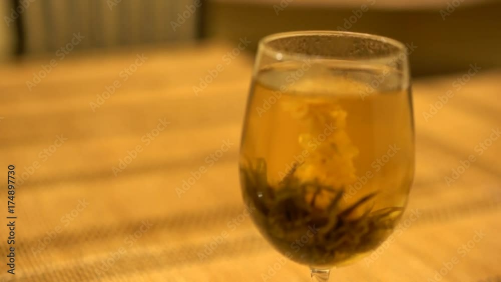 Close up motion slider shot of a special hot flower tea, brewed at home Close up motion slider shot of a special hot flower tea, brewed at home